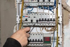 electrician working on an electrical switchboard