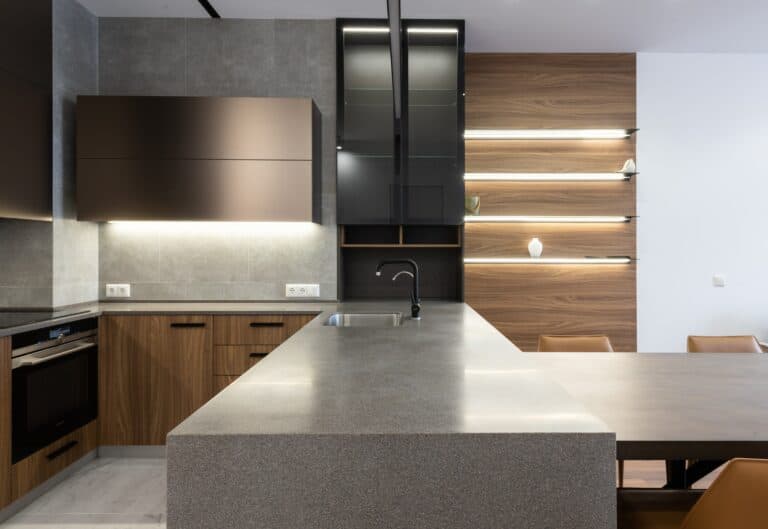 A contemporary-style kitchen with modern lighting.