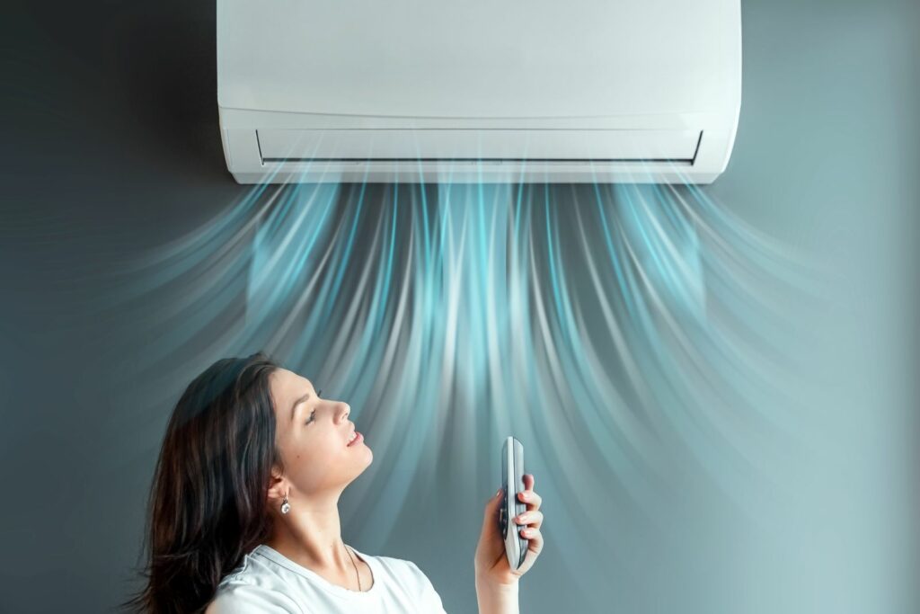 woman with air conditioning unit